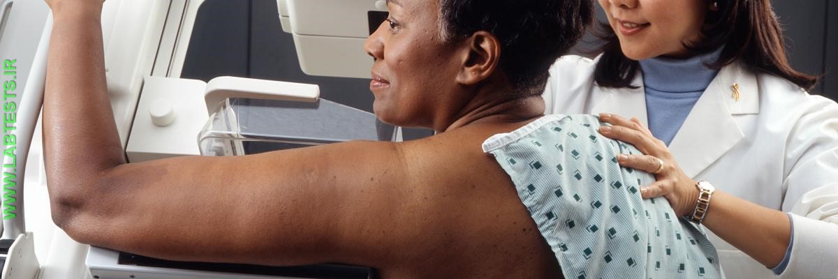 woman getting mammogram