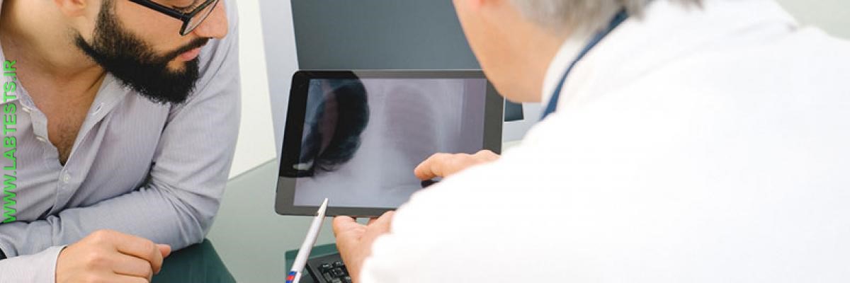 Doctor talking to a male patient about health