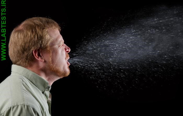 Photo of man sneezing